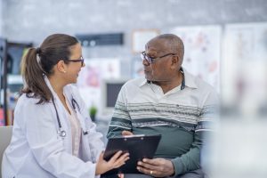 Man talking advice from a doctor.