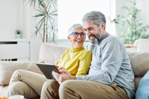 senior couple use tablet
