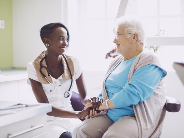 Doctor consulting her patient