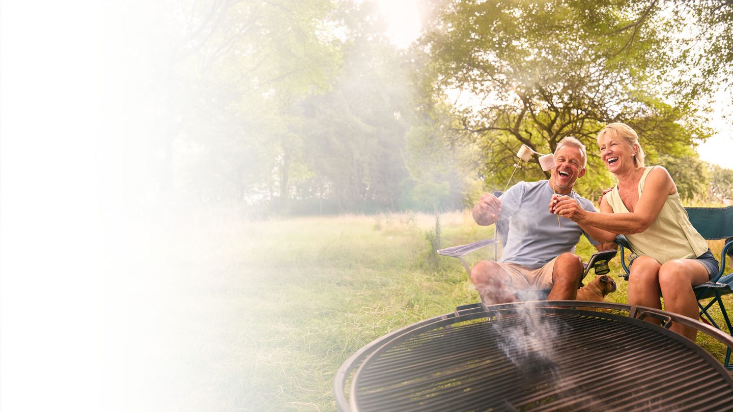 Couple grilling marshmellows